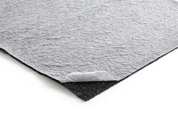 Drainage geocomposite: core of PP monofilaments bonded to 2 nonwoven geotextiles, 8 mm thick