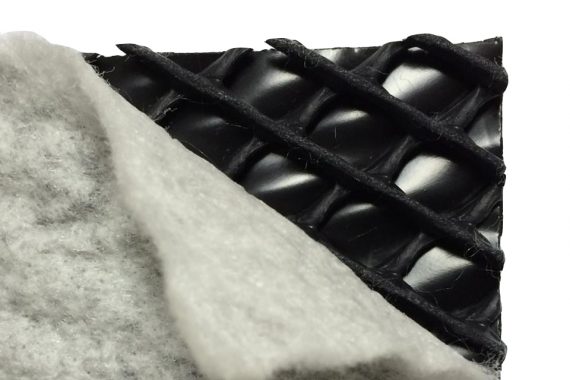 HDPE geonet with one nonwoven geotextile and a waterproofing membrane